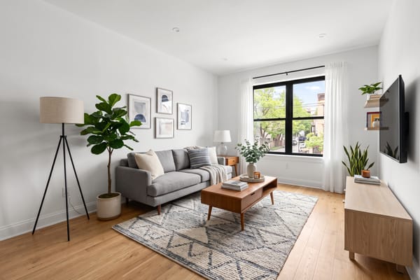 Empty apartment living room virtually staged with modern furniture